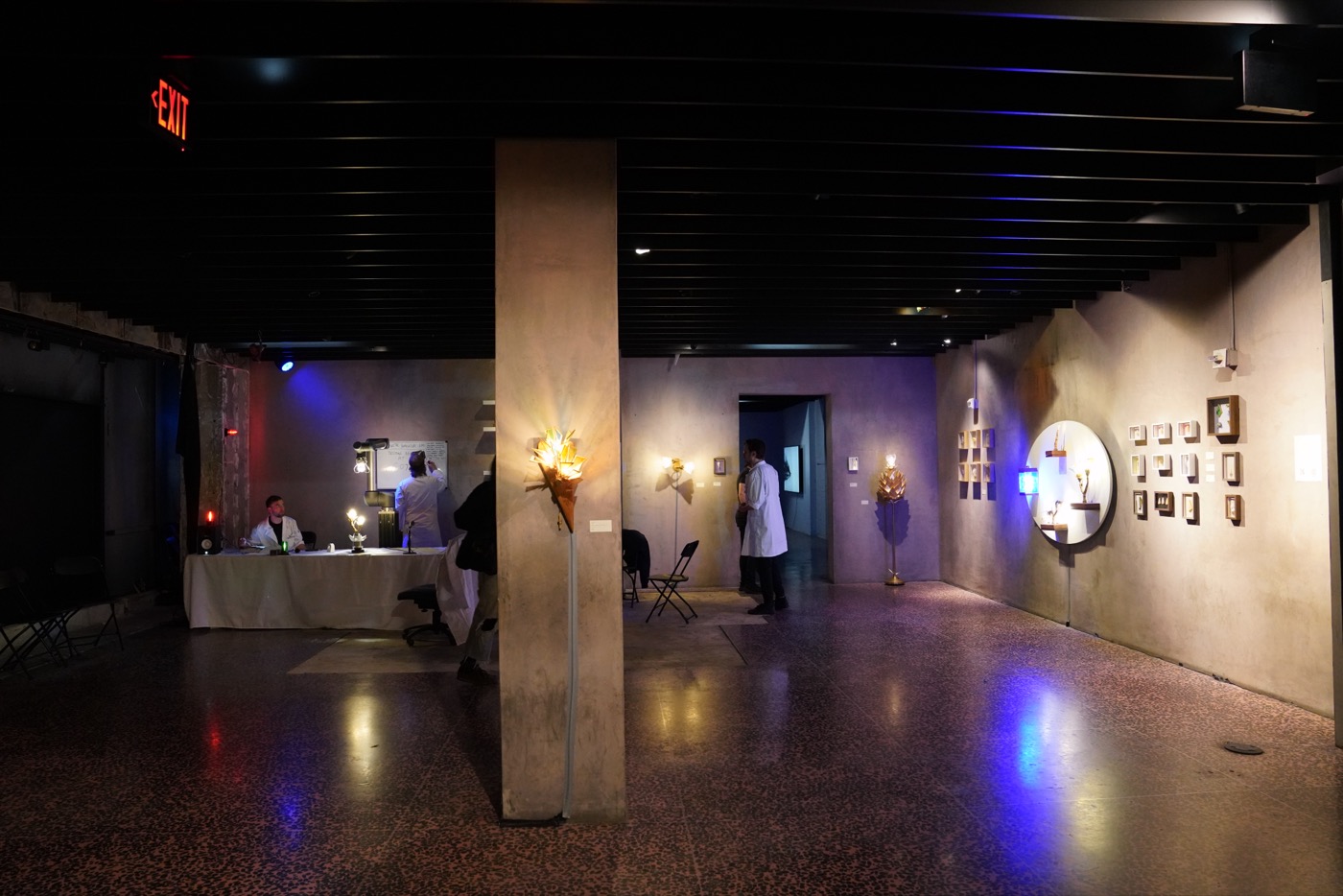 Gallery overview with artwork on walls