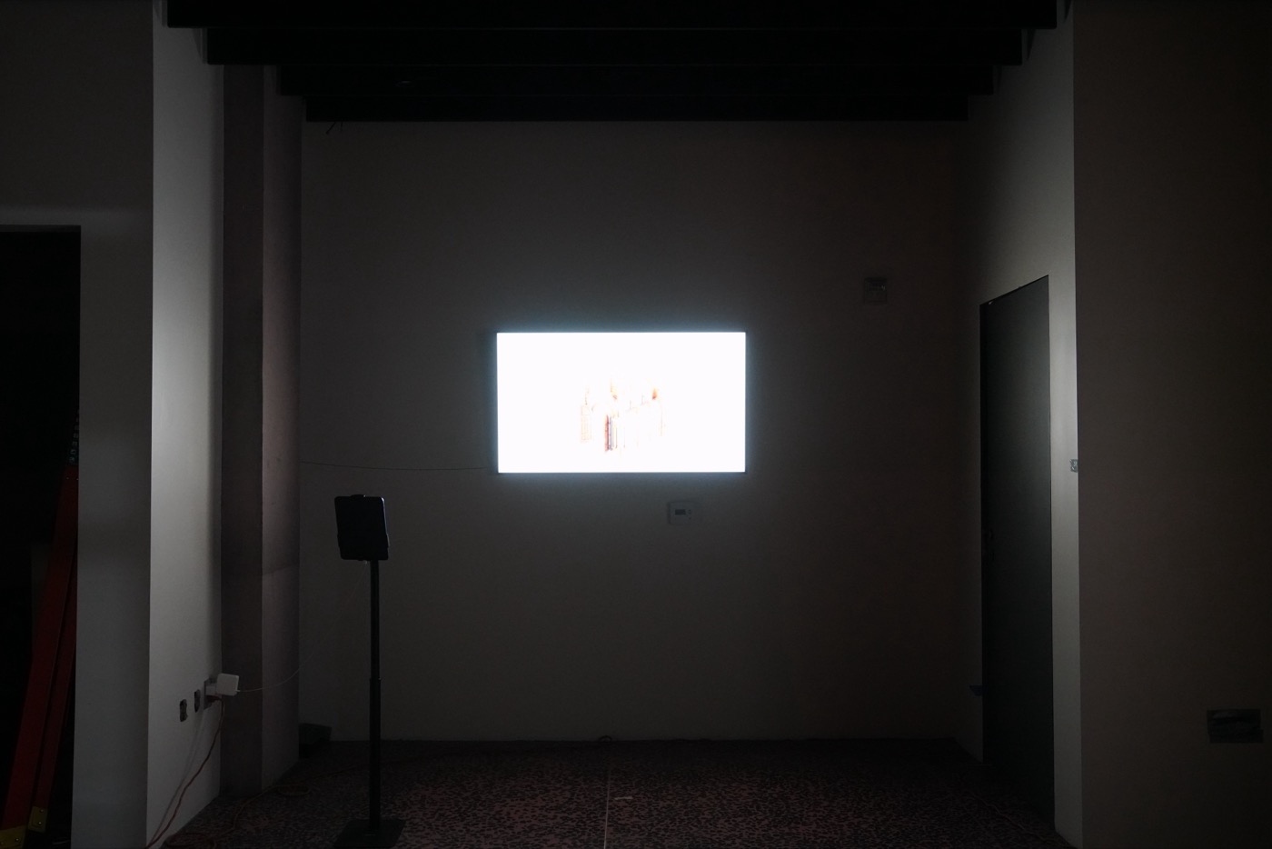 Screen-based work in small gallery room